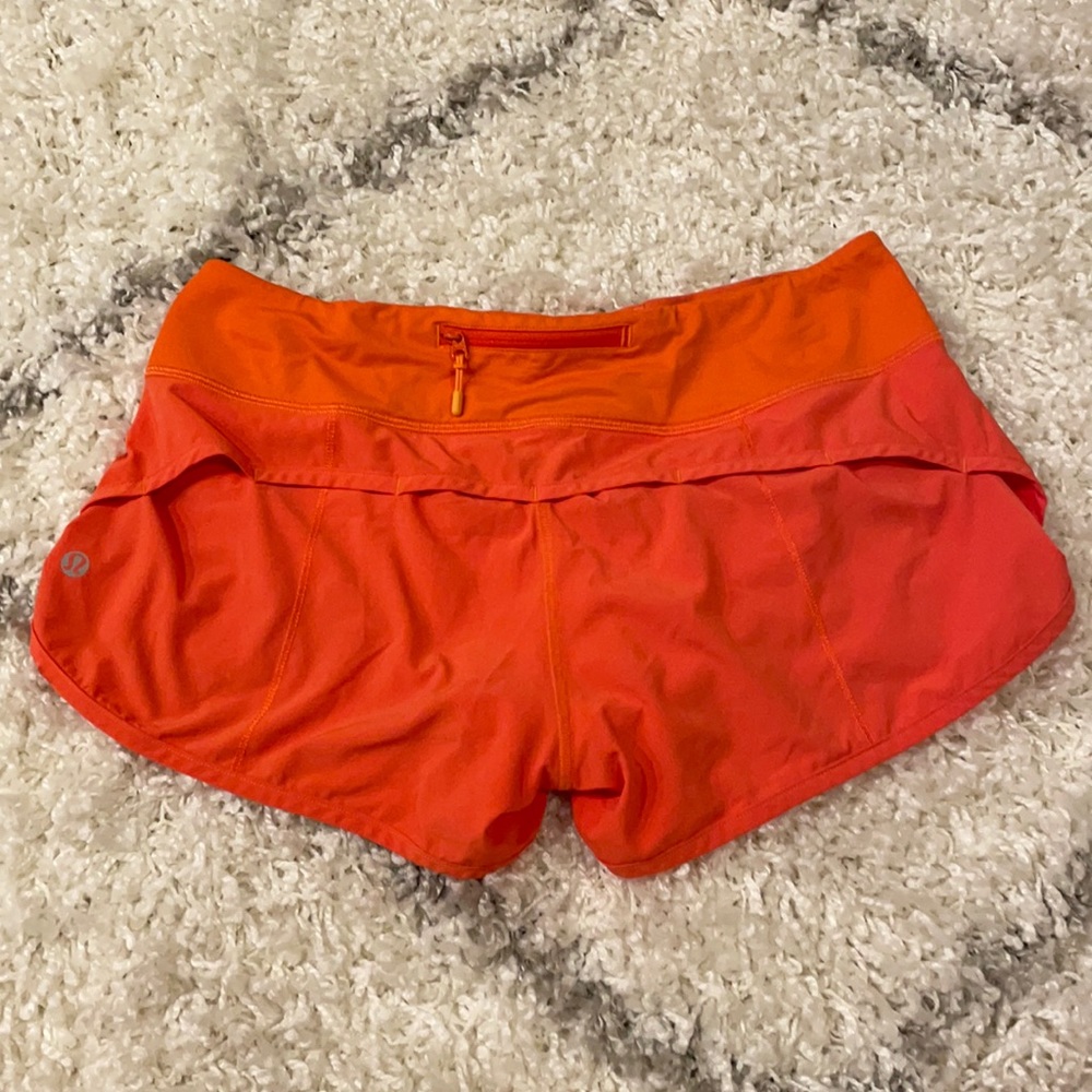 Lululemon orange running shorts